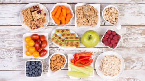 A colorful plate with various healthy snack options - FitnessPal