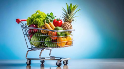 A shopping cart filled with colorful fruits, vegetables, and whole grain products - FitnessPal