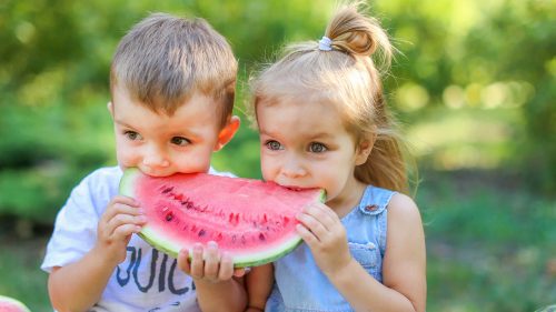 child enjoying a healthy snack - FitnessPal